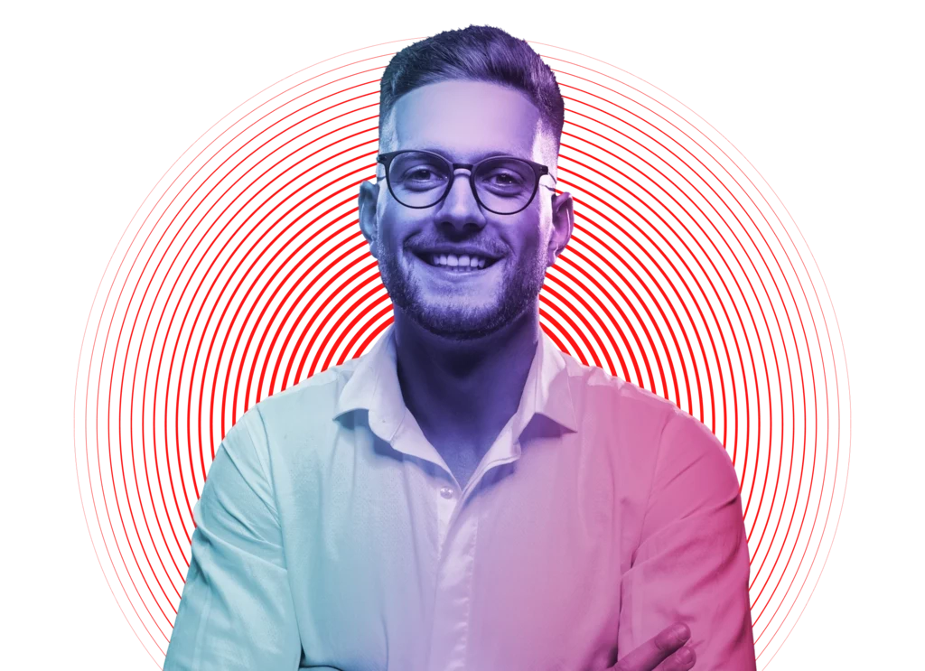 Man wearing glasses smiling at the camera